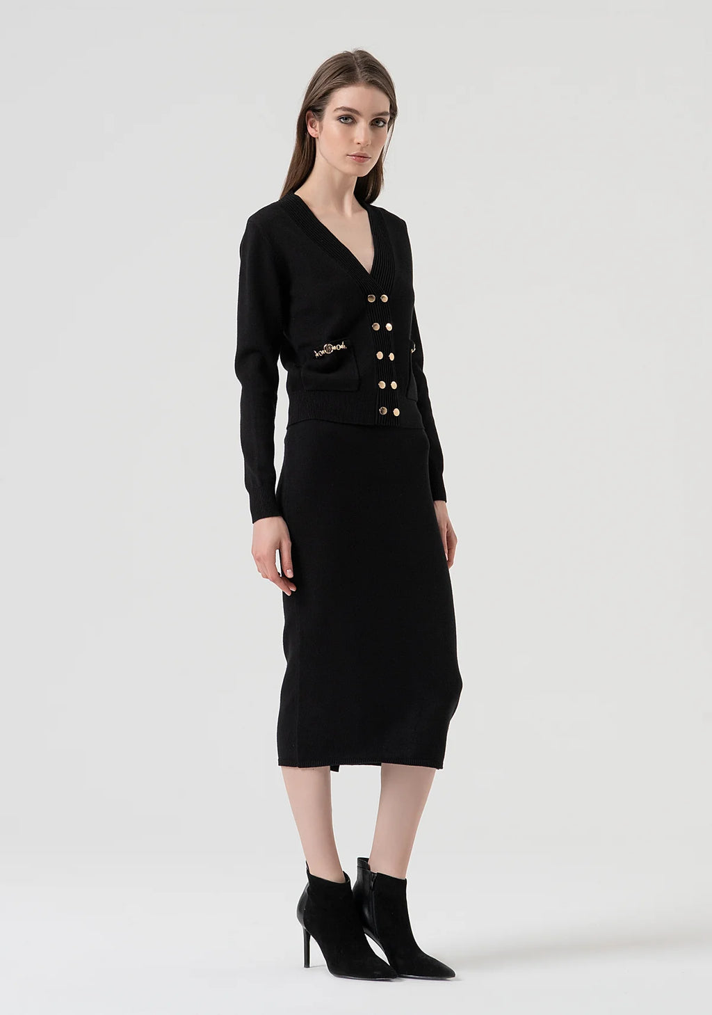 Saia malha justa com detalhes dourados Fracomina