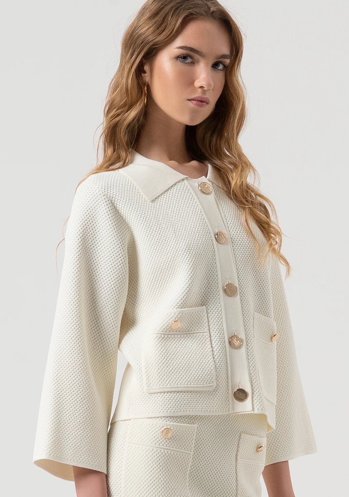 Cardigan com modelagem regular e ponto musgo Fracomina