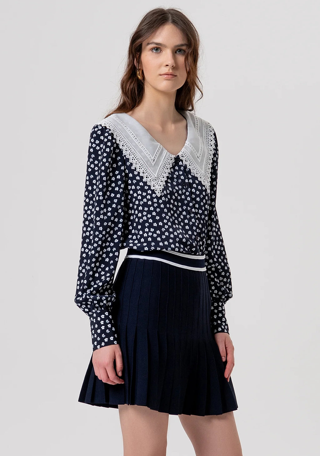 Minissaia de malha com modelagem evasê e efeito plissado FRACOMINA