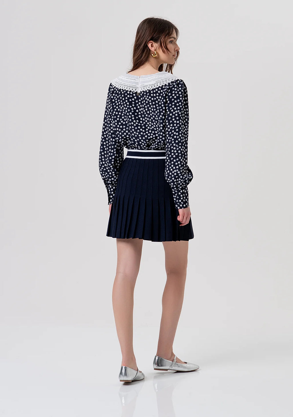 Minissaia de malha com modelagem evasê e efeito plissado FRACOMINA