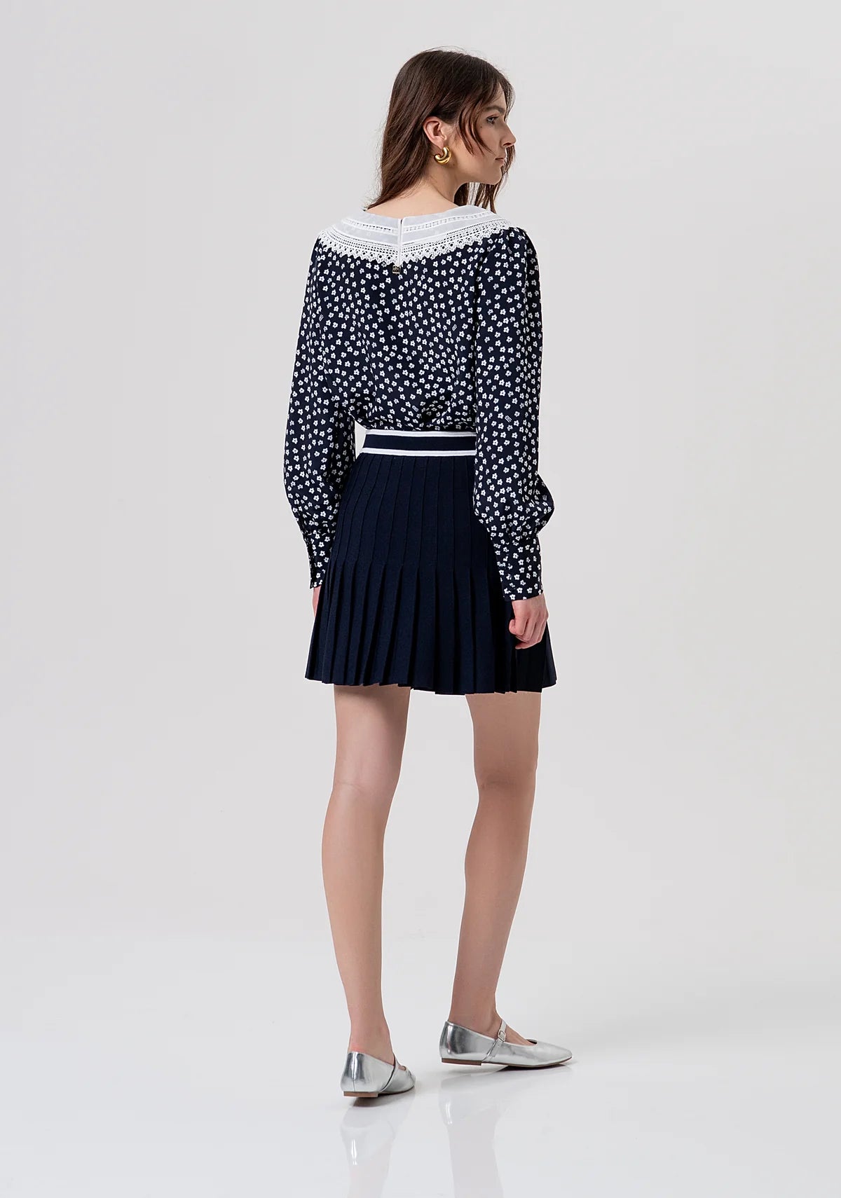 Minissaia de malha com modelagem evasê e efeito plissado FRACOMINA