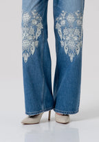 Jeans flare detalhe renda FRACOMINA