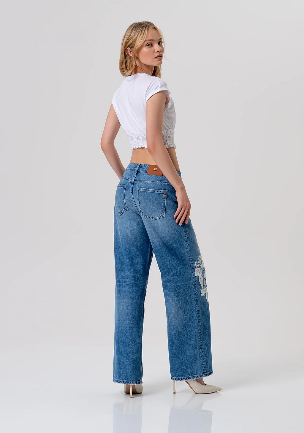 Jeans flare detalhe renda FRACOMINA