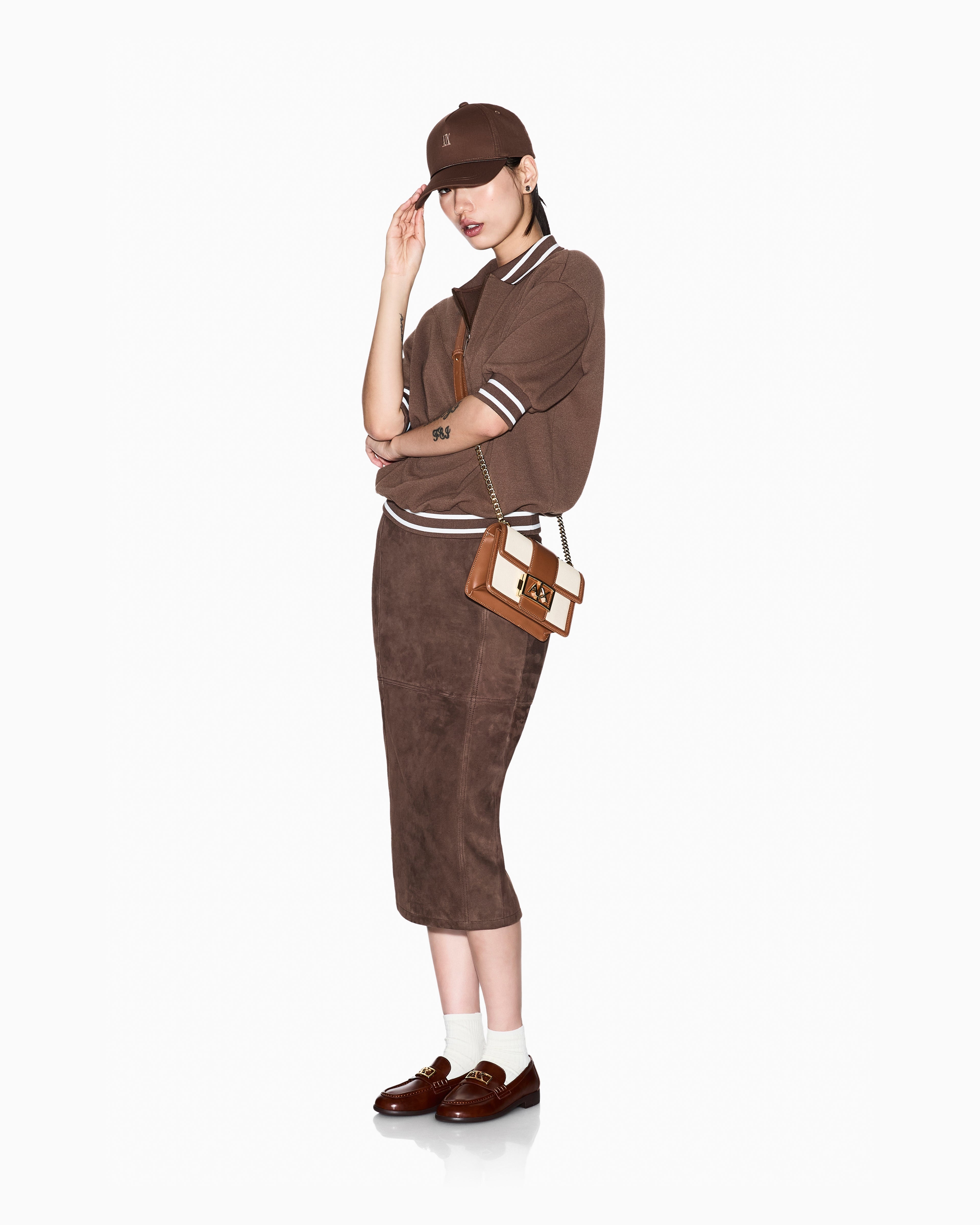 Mini bolsa transversal em tecido trançado Armani Exchange