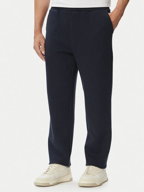 Calças BOSS Regular Fit azul-marinho para homem em algodão elástico, cintura elástica e corte confortável para uso casual.